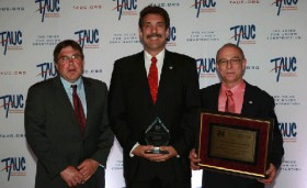 John Balik (center) received the prestigious J. J. Willis Craftperson of the Year Award at TAUC's annual Leadership Conference on May 9.